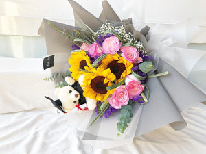 Prestige Wrap To You - Sunflower, Roses, Statice, Bany Breath, Eucalyptus, Bear Grass Erasmus Darwin